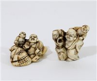 Lot 349 - A Japanese carved ivory okimono of Hotei