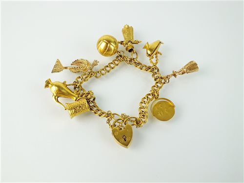 Lot 192 - A 9ct gold charm bracelet