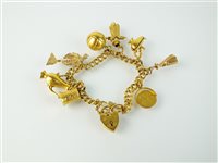 Lot 192 - A 9ct gold charm bracelet