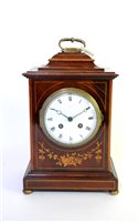 Lot 464 - A late Victorian mahogany and boxwood inlaid caddy top mantel clock