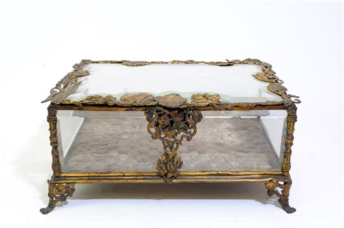 Lot 215 - A 19th century French gilt metal mounted glass jewellery box