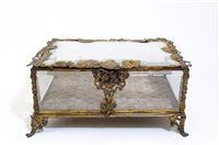 Lot 215 - A 19th century French gilt metal mounted glass jewellery box