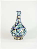 Lot 241 - An Iznik bottle vase