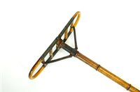 Lot 555 - An Edwardian shooting stick/seat