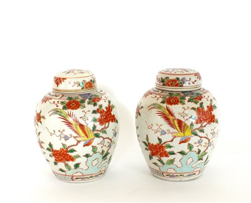 Lot 358 - A pair of Chinese famille rose porcelain vases, and covers, 20th century