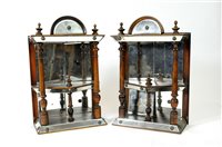 Lot 660 - A decorative pair of Victorian mahogany wall hanging miniature display shelves