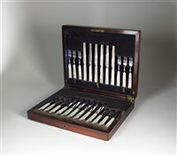 Lot 34 - A cased set of silver fruit knives and forks