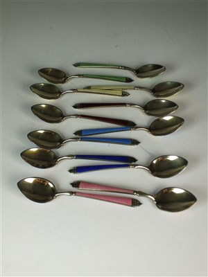 Lot 112 - A set of American silver gilt and enamel spoons