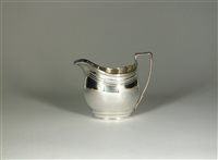 Lot 183 - A George III silver cream jug