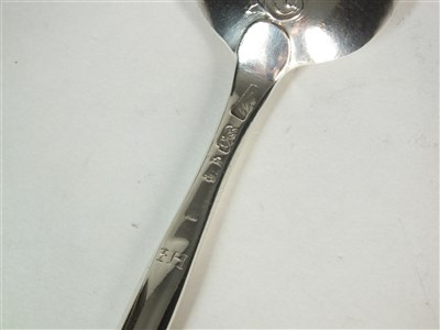 Lot 85 - A George II silver scroll back marrow spoon