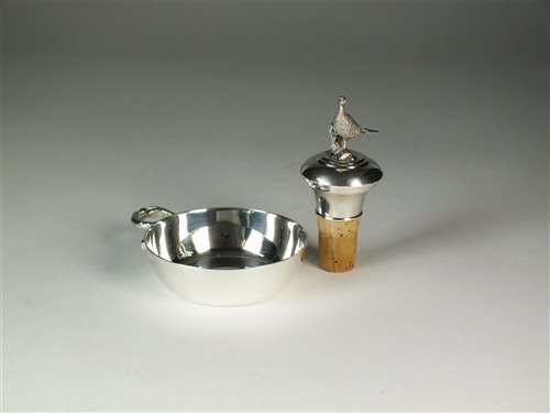 Lot 185 - A silver mounted bottle stopper and a wine taster
