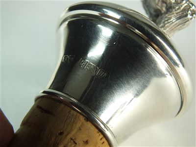 Lot 185 - A silver mounted bottle stopper and a wine taster