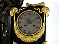 Lot 204 - A French bronze ormolu and black marble mantel clock
