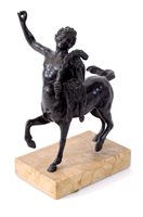 Lot 393 - A patinated bronze study of a young centaur