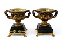 Lot 387 - A pair of gilt bronze Warwick vases