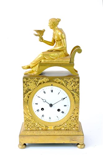 Lot 475 - A French Empire gilt bronze mantel clock