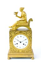 Lot 475 - A French Empire gilt bronze mantel clock