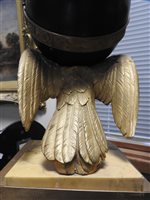 Lot 477 - An Empire style ormolu and bronze eagle and globe mantel clock