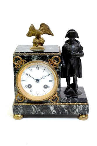 Lot 203 - A French bronze and ormolu mounted variegated marble mantel clock