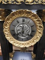 Lot 205 - A French ormolu and bronze empire style portico clock