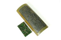 Lot 589 - A Chinese bamboo wrist rest and spinach jade tablet