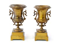 Lot 180 - A pair of French spun brass, 2 handled campana urns c1900