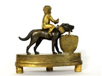 Lot 483 - A French ormolu and bronze novelty mantel time piece