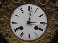 Lot 210 - A French rosewood and inlaid portico clock