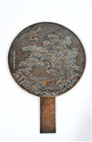 Lot 304 - A Japanese gilt bronze mirror