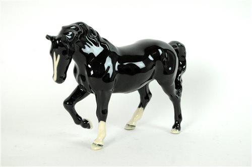 Lot 156 - A Beswick Collector's Club model of a Black Stocky Jogging Mare