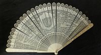 Lot 321 - A Canton carved ivory brise fan