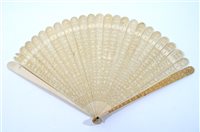 Lot 266 - A Canton carved ivory brise fan