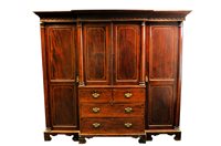 Lot 824 - A Victorian boxwood and ebony strung break front triple wardrobe