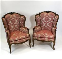 Lot 794 - A pair of Louis XV style 19th century wing back armchairs