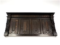 Lot 518 - A 17th century and later carved oak over mantel