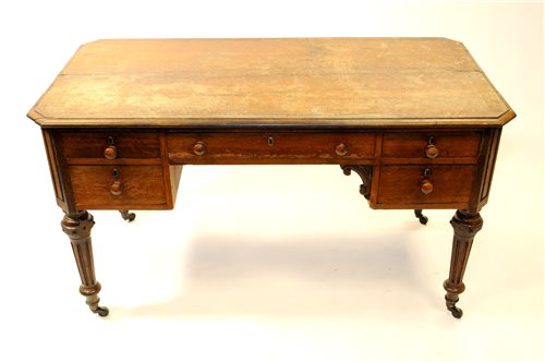 Lot 863 - A Victorian oak desk, mid 19th century