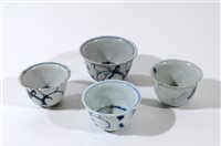 Lot 347 - Four Chinese blue and white porcelain cups, Ming