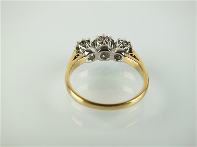 Lot 167 - A three stone diamond ring