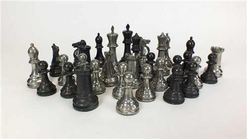 Lot 657 - A 20th century polished pewter and chrome chess set