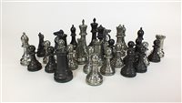 Lot 657 - A 20th century polished pewter and chrome chess set