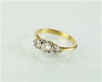 Lot 210 - A three stone diamond ring