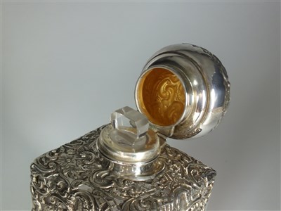 Lot 10 - A sillver mounted square perfume jar