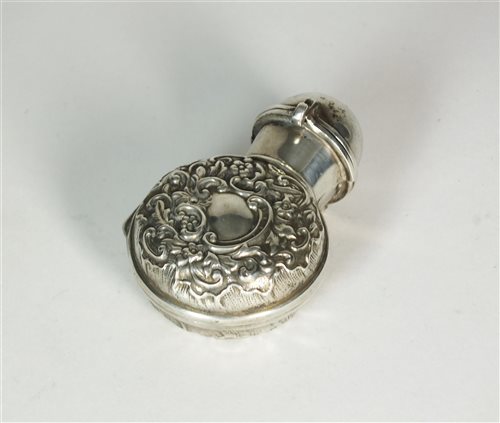 Lot 88 - A silver cased scent bottle