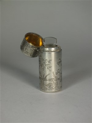 Lot 80 - A Victorian silver mounted scent bottle