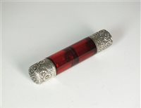 Lot 380 - A cranberry glass double ended scent bottle