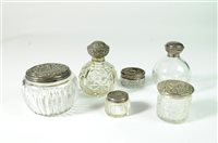 Lot 281 - A collection of silver topped dressing table wares