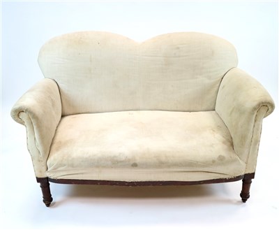 Lot 459 - A small Victorian upholstered wing backed sofa