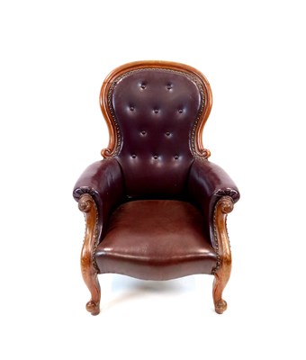 Lot 299 - A Victorian mahogany framed upholstered balloon back armchair