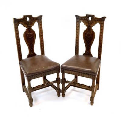 Lot 300 - A set of six Victorian stripped carved oak dining chairs