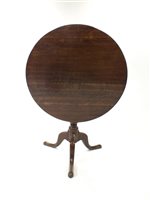 Lot 886 - A 19th century oak snap-top tripod table